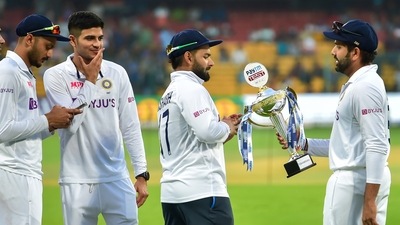 India Test captain Rohit Sharma shows the trophy to his teammates after winning the series against Sri Lanka (PTI) India Test captain Rohit Sharma shows the trophy to his teammates after winning the series against Sri Lanka (PTI)
