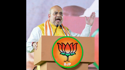 Union home minister Amit Shah addresses the public meeting organised to mark the end of the second phase of Telangana BJP president Bandi Sanjay's 'Praja Sangrama Yatra', at Tukkuguda in Rangareddy district on Saturday. (PTI) Union home minister Amit Shah addresses the public meeting organised to mark the end of the second phase of Telangana BJP president Bandi Sanjay's 'Praja Sangrama Yatra', at Tukkuguda in Rangareddy district on Saturday. (PTI)