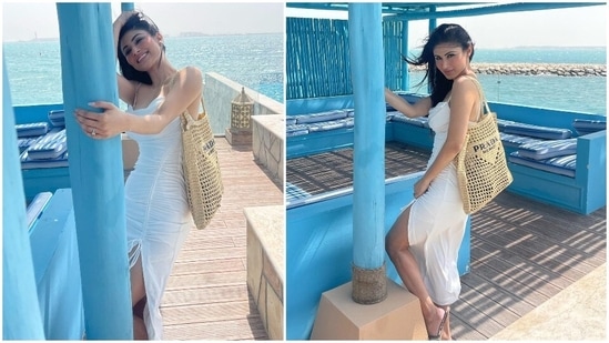 Ever since the gorgeous and talented Mouni Roy tied the knot with Dubai based businessman Suraj Nambiar, she has been constantly treating her Instagram family of more than 23.1 million with her travel. We finally get to see her husband in her latest Doha stills. For her beach day out, Mouni donned a white drawstring dress.(Instagram/@imouniroy)