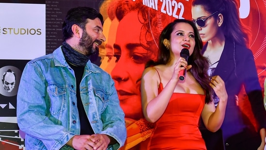 Kangana Ranaut speaks during a press conference for the promotion of her upcoming film Dhaakad in New Delhi, Thursday. Director Razneesh Ghai is also seen. (PTI Photo/Kamal Singh)(PTI)