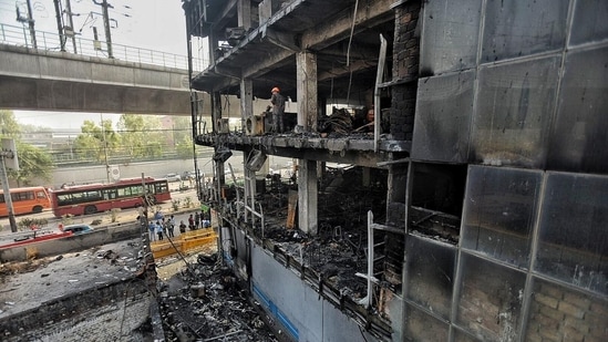 Firefighters along with NDRF personnel are conducting search and rescue operations at the incident site.(Raj K Raj/Hindustan Times)