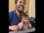 The little baby girl thinks the computer mouse is a phone in this Instagram video. (Instagram/@aarviarora2021) The little baby girl thinks the computer mouse is a phone in this Instagram video. (Instagram/@aarviarora2021)