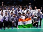India's team members pose with their nation flag after winning Thomas Cup title in Bangkok, Thailand, Sunday, May 15, 2022.(AP) India's team members pose with their nation flag after winning Thomas Cup title in Bangkok, Thailand, Sunday, May 15, 2022.(AP)
