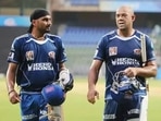 Harbhajan Singh and Andrew Symonds during a nets session during their stint with the Mumbai Indians. Harbhajan Singh and Andrew Symonds during a nets session during their stint with the Mumbai Indians.