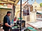 Sitting at the stall gives a tantalisingly close view of the shrine’s marble dome. Sitting at the stall gives a tantalisingly close view of the shrine’s marble dome.