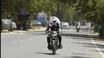 Gurugram, India-May 15: Commuters out on a hot summer day at Civil Lines road near John Hall, in Gurugram, India, on Sunday, May 15, 2022. (Photo by Parveen Kumar/Hindustan Times) Gurugram, India-May 15: Commuters out on a hot summer day at Civil Lines road near John Hall, in Gurugram, India, on Sunday, May 15, 2022. (Photo by Parveen Kumar/Hindustan Times)