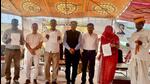 Jalore district collector Nishant Jain felicitating the donors, officials and others on achieving 100% health insurance coverage in Narsana. Jalore district collector Nishant Jain felicitating the donors, officials and others on achieving 100% health insurance coverage in Narsana.