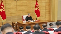 North Korean leader Kim Jong Un speaks at a politburo meeting of the ruling Workers' Party to inspect the country's antivirus efforts against the coronavirus disease (COVID-19) pandemic