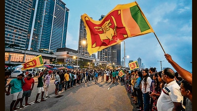 Anti-government demonstrators take part in a protest near the President's office in Colombo on May 10, 2022. (AFP) Anti-government demonstrators take part in a protest near the President's office in Colombo on May 10, 2022. (AFP)