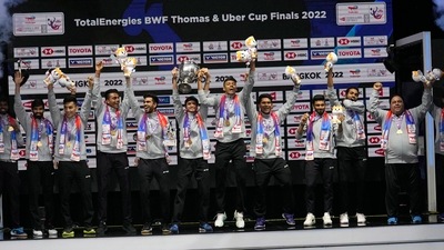 India's team members hold the trophy after winning Thomas Cup title in Bangkok, Thailand (AP) India's team members hold the trophy after winning Thomas Cup title in Bangkok, Thailand (AP)