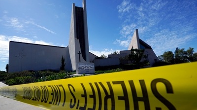 Crime scene tape is stretched across an area at Geneva Presbyterian Church in Laguna Woods, California, after a fatal shooting. (AP Photo) Crime scene tape is stretched across an area at Geneva Presbyterian Church in Laguna Woods, California, after a fatal shooting. (AP Photo)