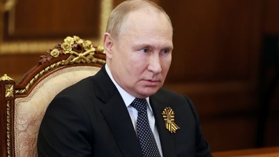 In a recent appearance, Putin was seen with his legs wrapped in a blanket.&nbsp; (via REUTERS)