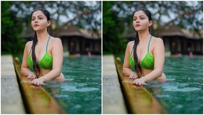 Rubina slipped into a multi-coloured bikini set for the swimming pool photoshoot. The actor chose a parrot green coloured bikini top with a plunging halter neckline, mirror embellishments, thread work in blue, red and yellow hues, and the thin straps that came in dual tones - neon pink and turquoise blue. (Instagram/@rubinadilaik) Rubina slipped into a multi-coloured bikini set for the swimming pool photoshoot. The actor chose a parrot green coloured bikini top with a plunging halter neckline, mirror embellishments, thread work in blue, red and yellow hues, and the thin straps that came in dual tones - neon pink and turquoise blue. (Instagram/@rubinadilaik)
