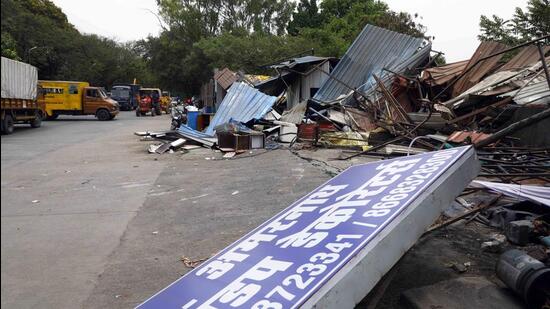 PMC conducted an anti-encroachment drive on DP road, Karvenagar in April. (HT FILE PHOTO) PMC conducted an anti-encroachment drive on DP road, Karvenagar in April. (HT FILE PHOTO)