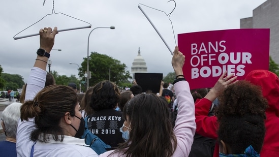 Abortion rights demonstrators walk to Capitol Hill during a nationwide rally in support of abortion rights in Washington, DC, on May 14, 2022.&nbsp;(Bloomberg)