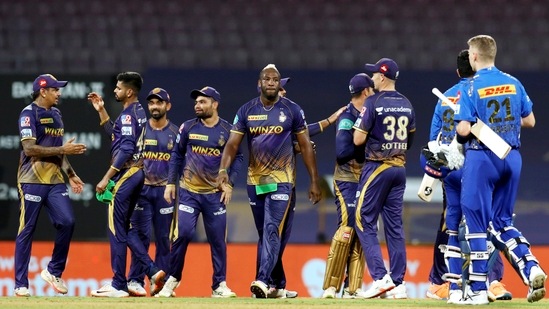 Kolkata Knight Riders and Mumbai Indians players greet each other