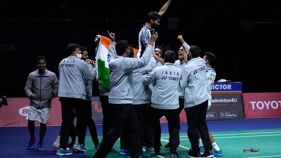 India's Srikanth Kidambi, center, and his teammate celebrate after winning against Indonesia's Jonatan Christie(AP)
