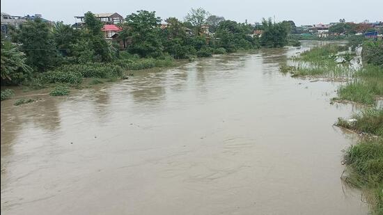 The water levels of Imphal River, Nambul River and Nambol River are still flowing above the dangerous mark as rainfall continues in their catchment areas. Many low lying areas of Imphal also continued to be submerged due to lack of a proper drainage system. (HT PHOTO.)