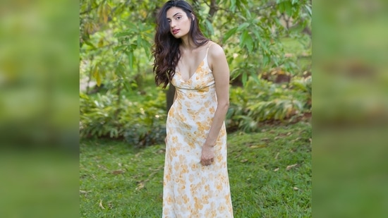 Athiya Shetty's outfit features a cut-out at the back with adjustable straps and zip detailing.(Instagram/@elevate_promotions)