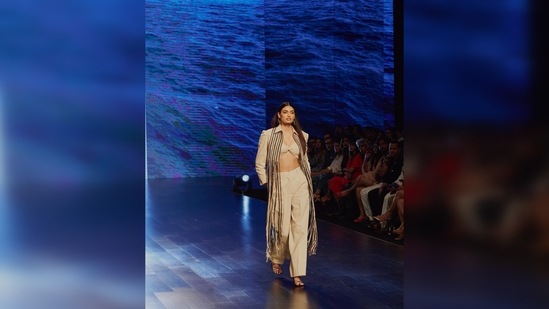 Athiya Shetty walked the ramp for the designer duo Rishi and Vibhuti at a fashion week donning a beige bandeau top and trousers.(Instagram/@athiyashetty)