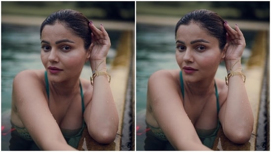 Rubina teamed the bikini top with matching bikini bottoms in dual turquoise blue and parrot green shades with ties on either side in neon pink colours. The low-rise bottoms rounded off the actor's bikini set, which she styled with minimal aesthetics.(Instagram/@rubinadilaik)