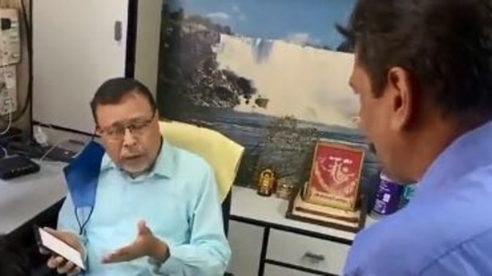 Maharashtra BJP president Chandrakant Patil posted the video of the assault on Ambekar.(Screengrab/Twitter/@ChDadaPatil)
