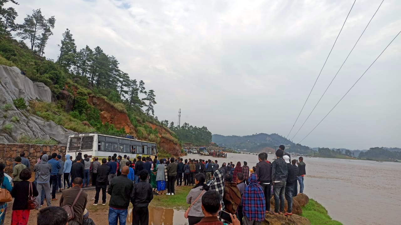 A road is flooded in Assam triggered by incessant rainfall, in Dima Hasao on Sunday. (ANI) A road is flooded in Assam triggered by incessant rainfall, in Dima Hasao on Sunday. (ANI)