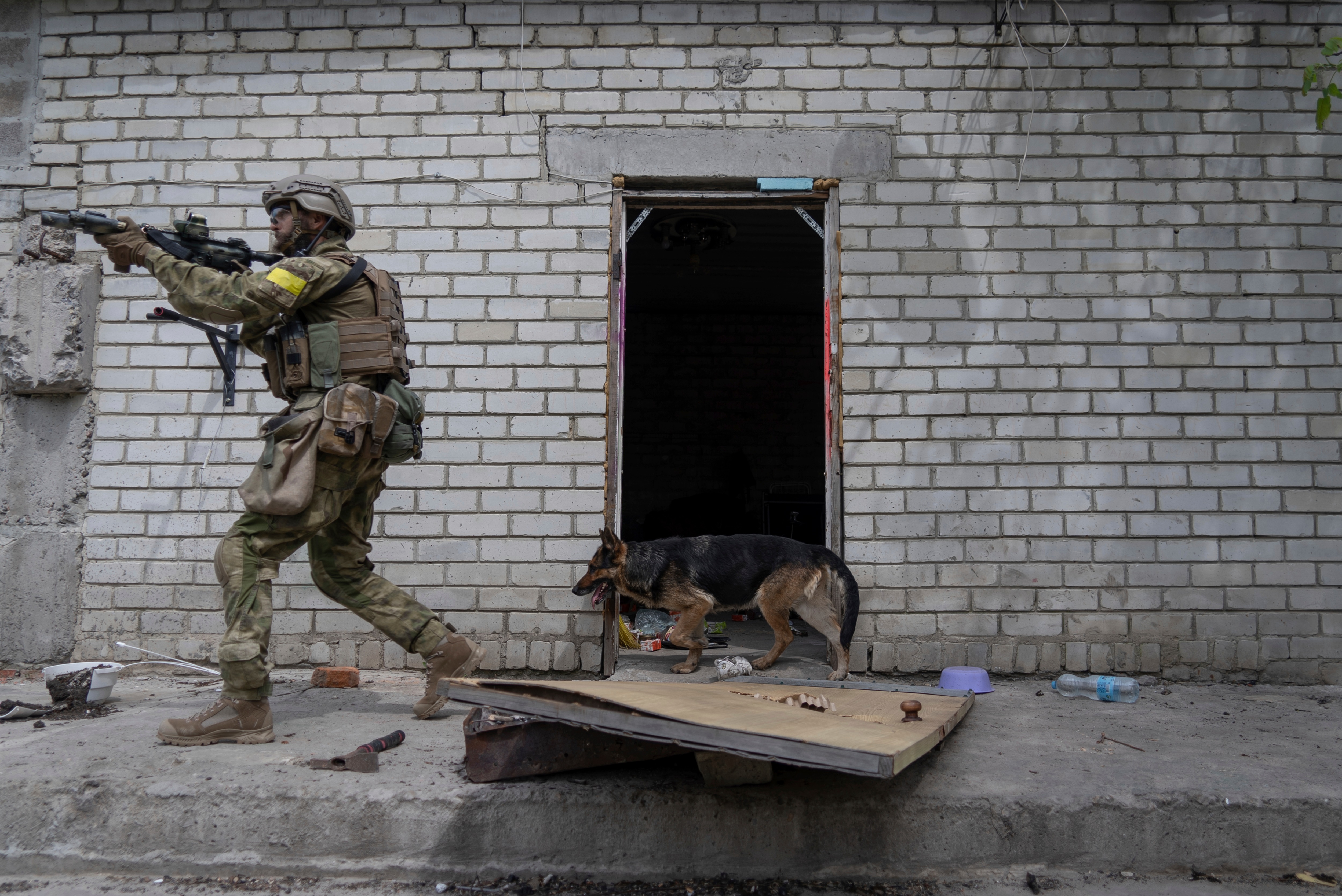 A Ukrainian serviceman patrols during a reconnaissance mission in a recently retaken village on the outskirts of Kharkiv, on May 14, 2022. (AP) A Ukrainian serviceman patrols during a reconnaissance mission in a recently retaken village on the outskirts of Kharkiv, on May 14, 2022. (AP)