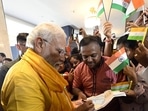 Prime Minister Narendra Modi receives a warm welcome from the Indian diaspora, in Lumbini on Monday. (ANI/ PIB)