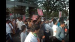 NCP party workers protest over fuel price hike in front of a venue attended by Union minister Smriti Irani at SB road on Monday. (HT PHOTO) NCP party workers protest over fuel price hike in front of a venue attended by Union minister Smriti Irani at SB road on Monday. (HT PHOTO)