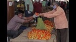 A stall selling tomatoes in the city, on Monday. (Ravindra Joshi/HT PHOTO) A stall selling tomatoes in the city, on Monday. (Ravindra Joshi/HT PHOTO)