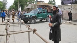 Taliban fighters stand guard in Kabul, Afghanistan.