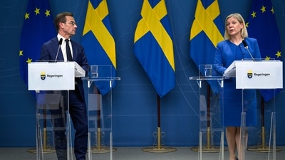Sweden's Prime Minister Magdalena Andersson, right, and the Moderate Party's leader Ulf Kristersson give a news conference in Stockholm, Sweden, Monday, May 16, 2022.&nbsp; (AP)