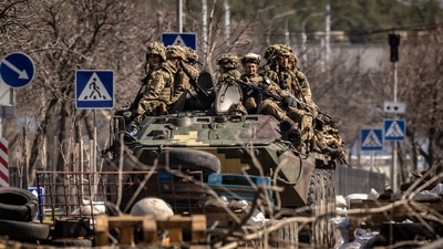 Ukrainian soldiers sit on a armoured military vehicule in the city of Severodonetsk, Donbass region. (AFP/Image used only for representation) Ukrainian soldiers sit on a armoured military vehicule in the city of Severodonetsk, Donbass region. (AFP/Image used only for representation)