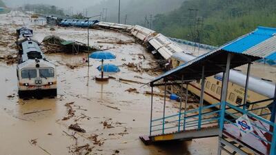 A scene at the New Halflong train station in Dima Hasao district of Assam on Monday, while one train has been uprooted from the track due to landslides another is stranded due to debris. (Northeastern Frontier Railway.) A scene at the New Halflong train station in Dima Hasao district of Assam on Monday, while one train has been uprooted from the track due to landslides another is stranded due to debris. (Northeastern Frontier Railway.)