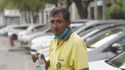 Ram Lakhan Singh, a parking attendant, at Connaught Place on Monday. (Arvind Yadav/HT) Ram Lakhan Singh, a parking attendant, at Connaught Place on Monday. (Arvind Yadav/HT)