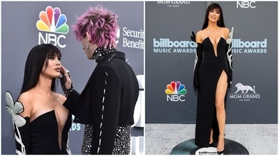 Megan Fox and Machine Gun Kelly arrived at the BBMAs in coordinated black ensembles and served couple goals in their quirky yet jaw-dropping style. While Megan donned a sultry David Koma gown, Kelly made a statement in a metal spike-accented Dolce & Gabbana suit teamed with a Swarovski crystal-adorned top, studded boots and candy pink hair. (AP, Reuters) Megan Fox and Machine Gun Kelly arrived at the BBMAs in coordinated black ensembles and served couple goals in their quirky yet jaw-dropping style. While Megan donned a sultry David Koma gown, Kelly made a statement in a metal spike-accented Dolce & Gabbana suit teamed with a Swarovski crystal-adorned top, studded boots and candy pink hair. (AP, Reuters)