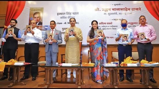 Maharashtra Chief Minister Uddhav Thackeray with his wife Rashmi Thackeray, his son and State Tourism Minister Aaditya Thackeray and other dignitaries releases a book titled 'Iqbal Singh Chahal-Covid Warrior' authored by Minhaz Merchant (2L) during an event in Mumbai on Monday. (Aaditya Thackeray/Twitter)