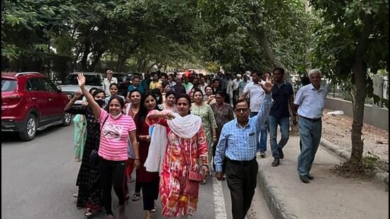 Around 300 residents took out a rally from Sector 46 to Bakhtawar Chowk in Gurugram on Monday. (SOURCED)