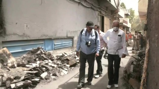 NHRC team at Mundka fire tragedy spot in Delhi on Monday. (ANI) NHRC team at Mundka fire tragedy spot in Delhi on Monday. (ANI)