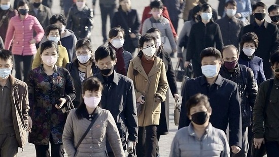 FILE PHOTO: People wearing protective face masks commute amid concerns over the new coronavirus disease (COVID-19) in Pyongyang, North Korea.(REUTERS)