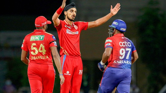Arshdeep Singh of Punjab Kings celebrates the wicket of Sarfaraz Khan of Delhi Capitals during the 64th T20 cricket match of the Indian Premier League 2022(PTI)