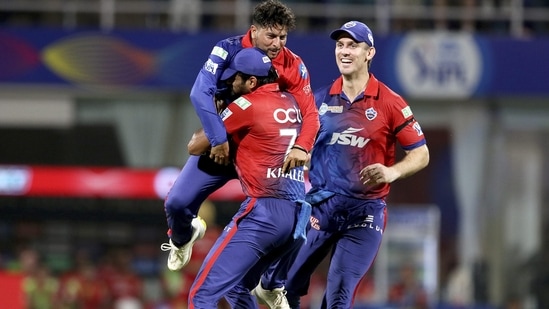 Kuldeep Yadav of Delhi Capitals celebrates with teammates, the wicket of Harpreet Brar of Punjab Kings(PTI)