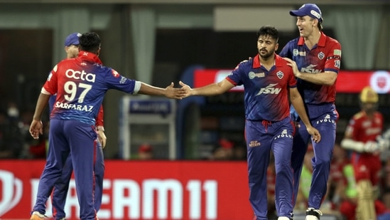 Shardul Thakur of Delhi Capitals celebrates with teammates, the wicket of Kagiso Rabada of Punjab Kings during the 64th T20 cricket match of the Indian Premier League 2022(PTI)