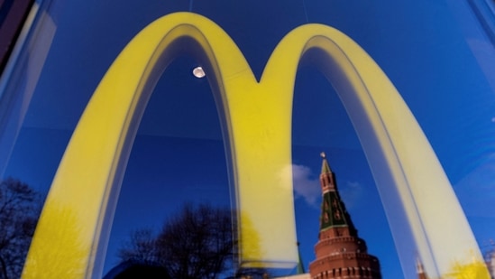 &nbsp;A logo of the McDonald's restaurant is seen in the window with a reflection of Kremlin's tower in central Moscow.(REUTERS)