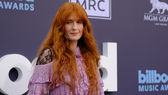 English singer Florence Welch attended the 2022 Billboard Music Awards at the MGM Grand Garden Arena in a lavender gown adorned with ruffled details, sequins and lace embroidery.&nbsp;(AFP)