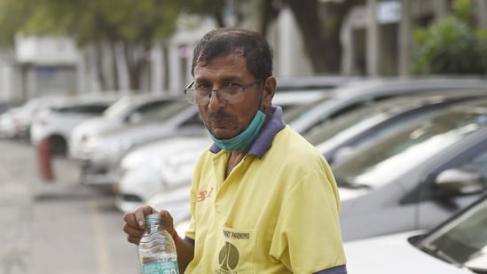 Ram Lakhan Singh, a parking attendant, at Connaught Place on Monday. (Arvind Yadav/HT)