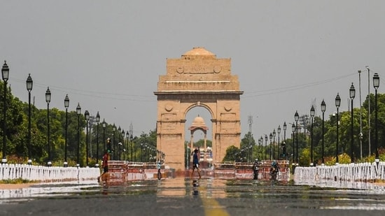 A mirage seen along Rajpath, as the temperature soared in New Delhi on May 24. The red category alert was issued for severe heatwave conditions on May 25 and 26. (Amal KS / HT Photo)