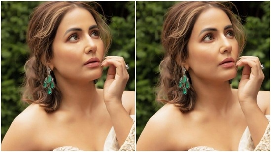 Hina styled her coloured tresses into a messy ponytail with a middle part as she posed for the outdoor photoshoot in London.(Instagram/@realhinakhan)