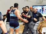 Wrestler Satender Malik assaults referee Jagbir Singh during the national trails to pick the men's wrestling squad for the Commonwealth Games.(Sanjeev Verma/HT Photo) Wrestler Satender Malik assaults referee Jagbir Singh during the national trails to pick the men's wrestling squad for the Commonwealth Games.(Sanjeev Verma/HT Photo)